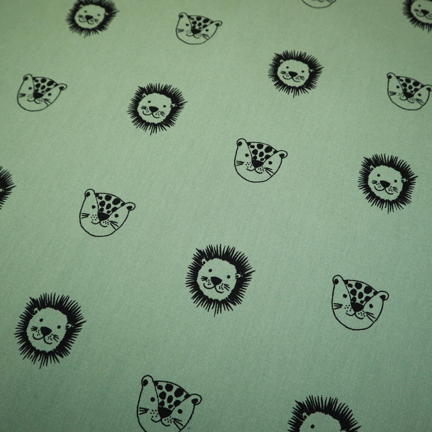 100% Organic Cotton Poplin in Sage Lion Print