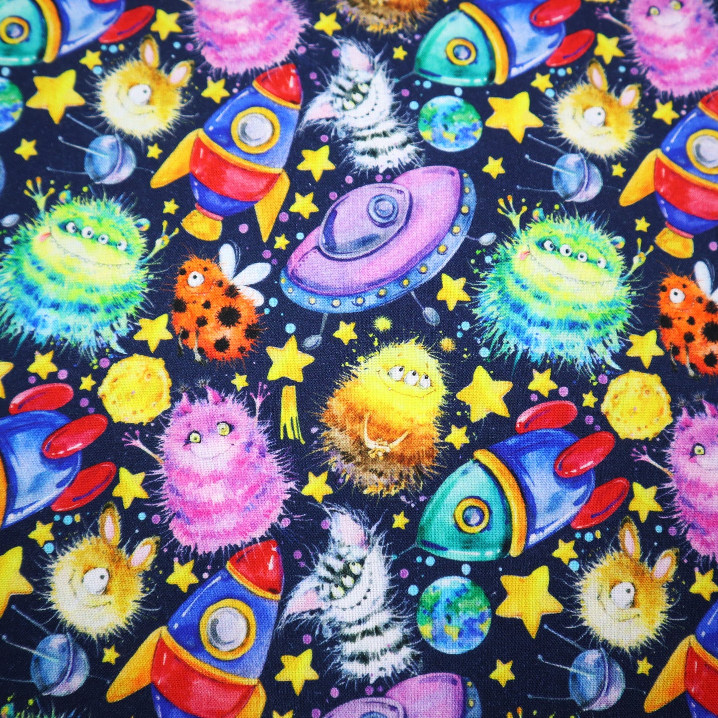 100% Cotton in Space Monster Print