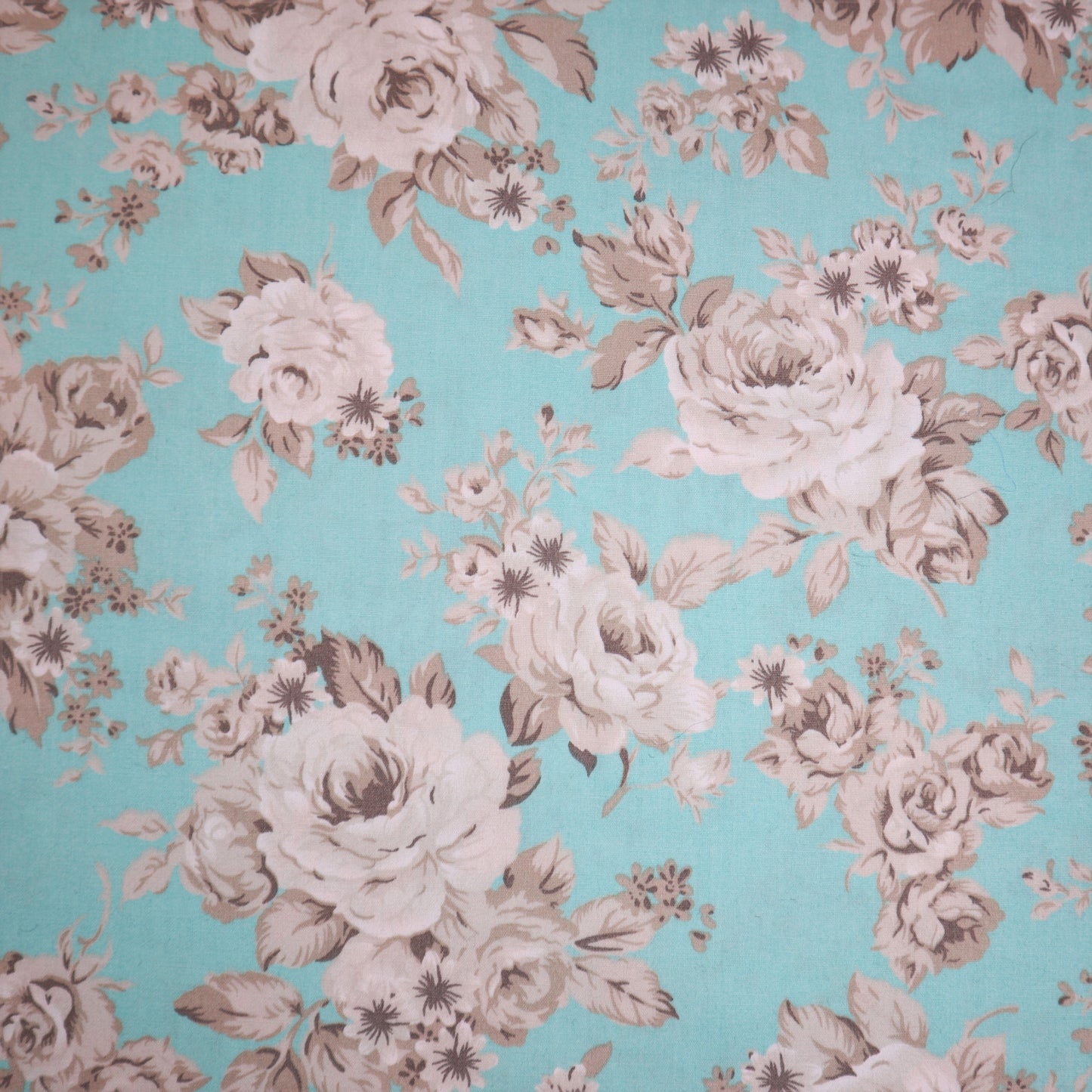 100% Cotton in Aqua Rose Print